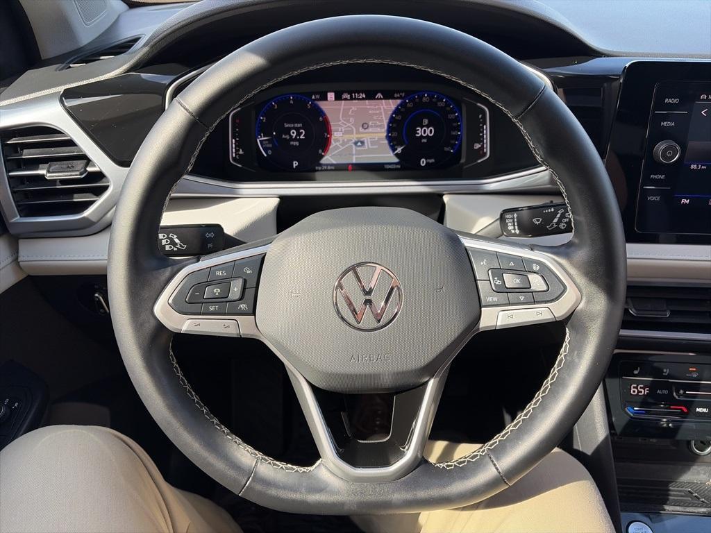 used 2025 Volkswagen Taos car, priced at $31,495