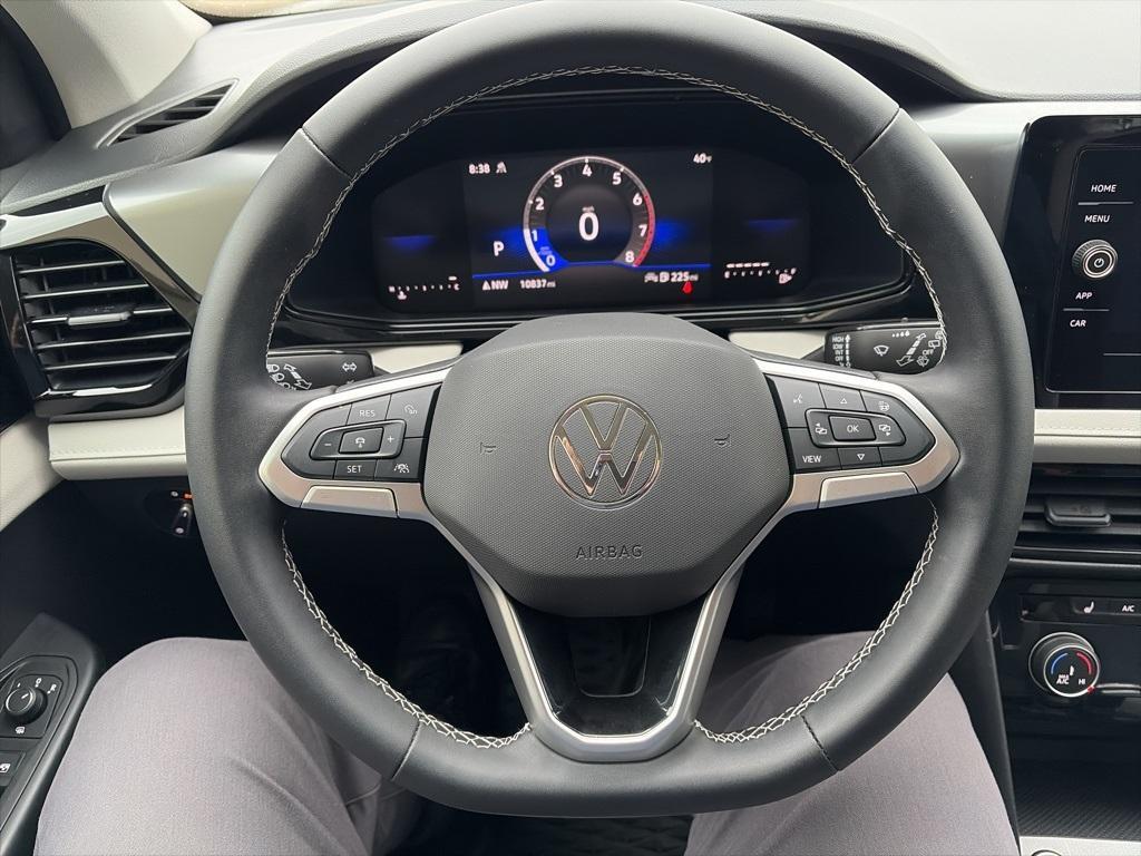 used 2025 Volkswagen Taos car, priced at $24,995