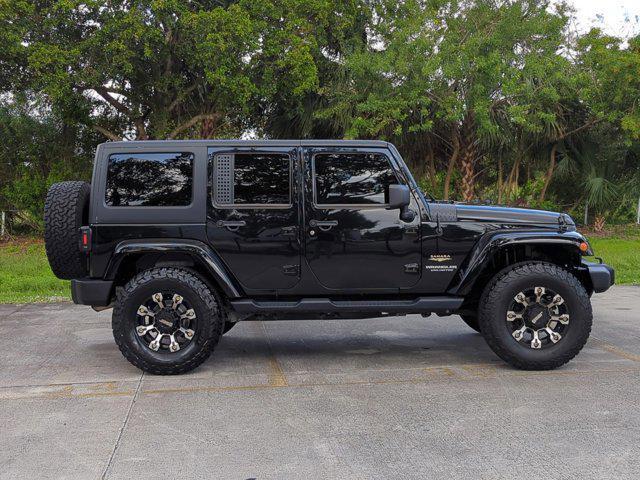 used 2013 Jeep Wrangler Unlimited car, priced at $18,595