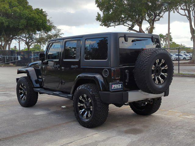 used 2013 Jeep Wrangler Unlimited car, priced at $18,595