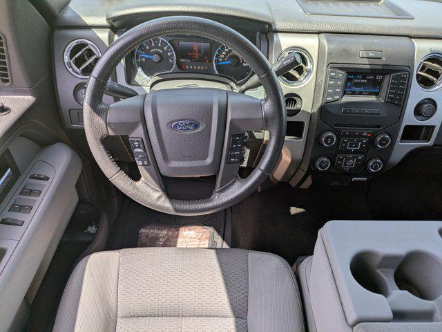 used 2014 Ford F-150 car, priced at $11,977
