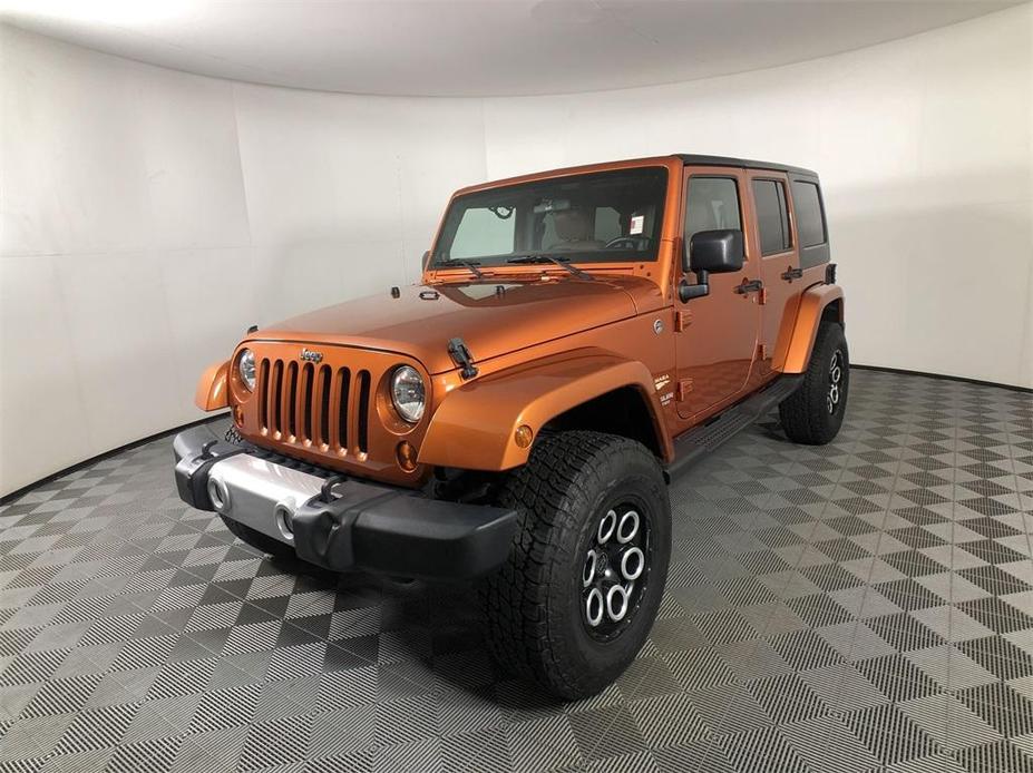 used 2011 Jeep Wrangler Unlimited car, priced at $20,575