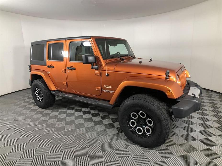 used 2011 Jeep Wrangler Unlimited car, priced at $20,575