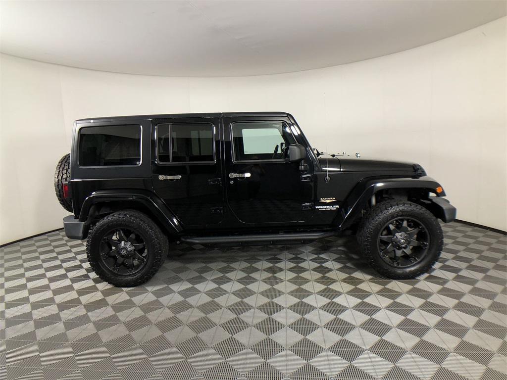 used 2013 Jeep Wrangler Unlimited car, priced at $21,791