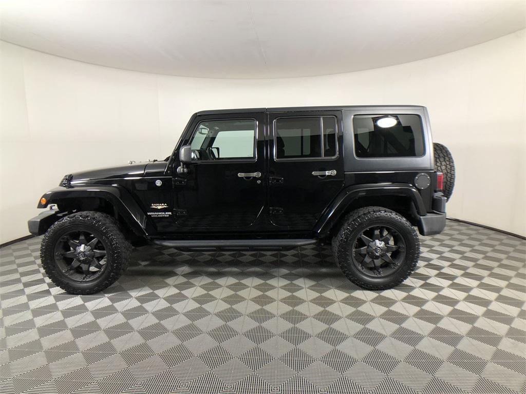 used 2013 Jeep Wrangler Unlimited car, priced at $21,791