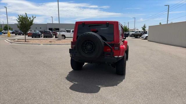 used 2014 Jeep Wrangler Unlimited car, priced at $25,298