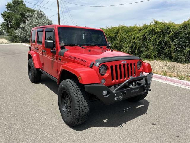 used 2014 Jeep Wrangler Unlimited car, priced at $25,298