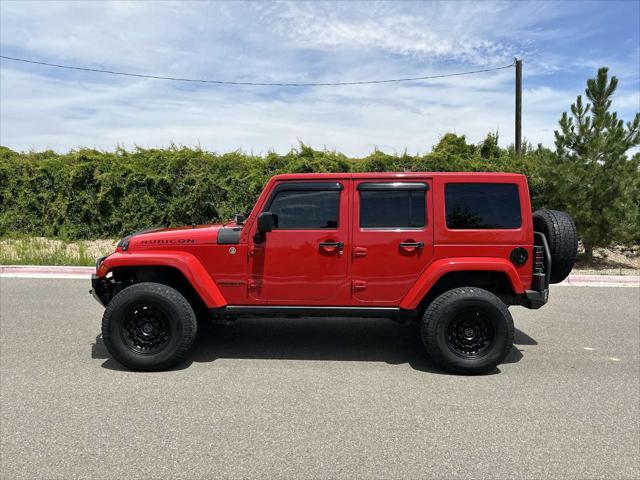 used 2014 Jeep Wrangler Unlimited car, priced at $25,298