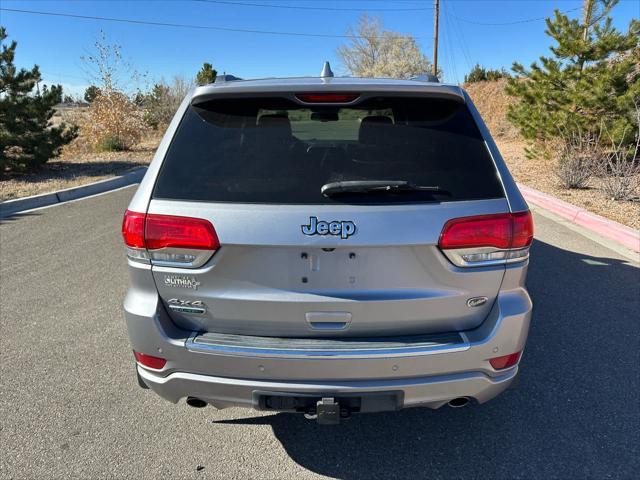 used 2014 Jeep Grand Cherokee car, priced at $13,386