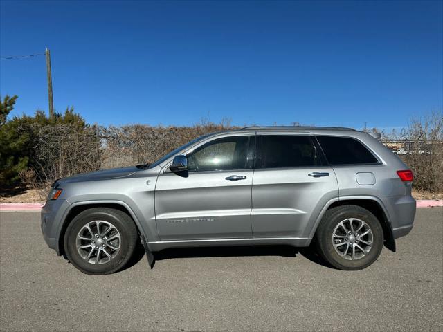 used 2014 Jeep Grand Cherokee car, priced at $13,386