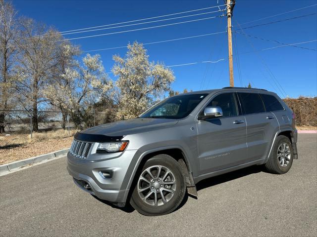 used 2014 Jeep Grand Cherokee car, priced at $13,386