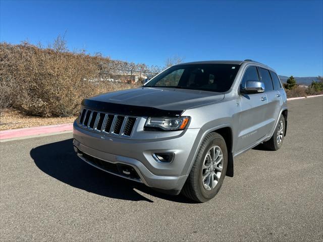 used 2014 Jeep Grand Cherokee car, priced at $13,386