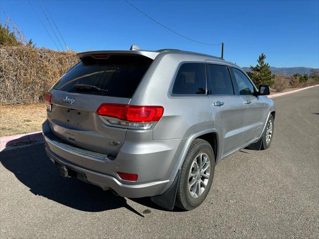 used 2014 Jeep Grand Cherokee car, priced at $13,386