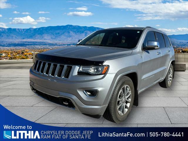 used 2014 Jeep Grand Cherokee car, priced at $13,386