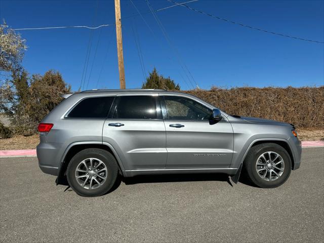 used 2014 Jeep Grand Cherokee car, priced at $13,386