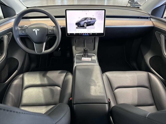 used 2024 Tesla Model Y car, priced at $39,420