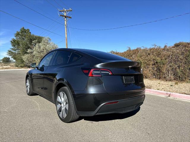 used 2024 Tesla Model Y car, priced at $39,420