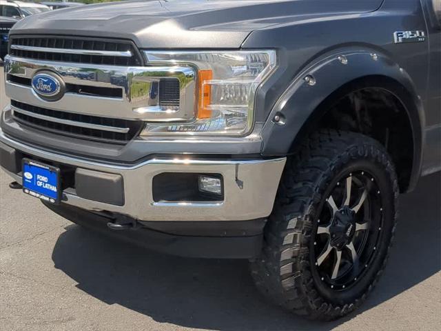 used 2018 Ford F-150 car, priced at $22,221