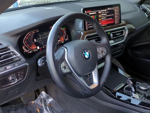 used 2024 BMW X4 car, priced at $41,200