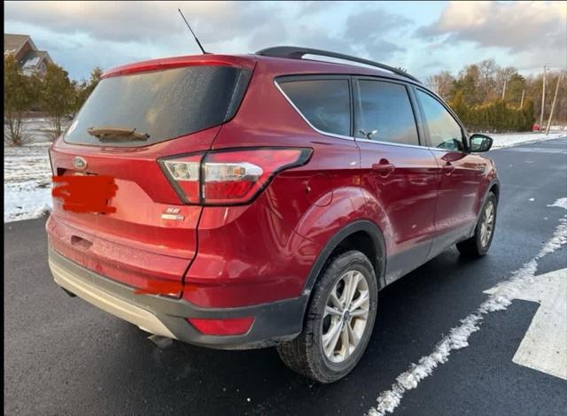 used 2018 Ford Escape car, priced at $15,300