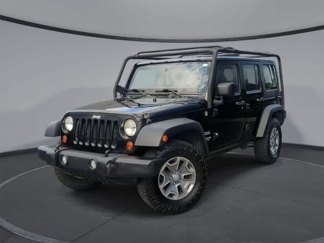 used 2012 Jeep Wrangler Unlimited car, priced at $15,616