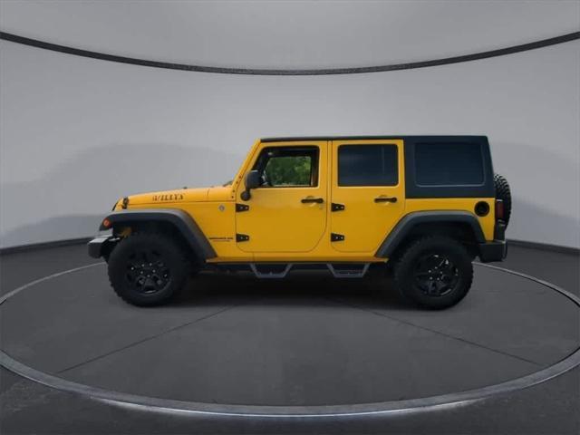 used 2015 Jeep Wrangler Unlimited car, priced at $19,808
