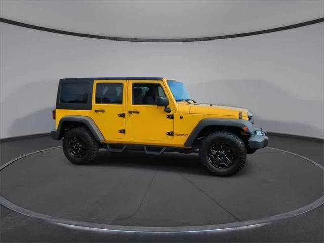used 2015 Jeep Wrangler Unlimited car, priced at $19,808