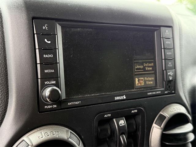 used 2016 Jeep Wrangler Unlimited car, priced at $15,000