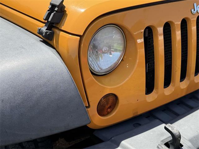 used 2012 Jeep Wrangler Unlimited car, priced at $12,249