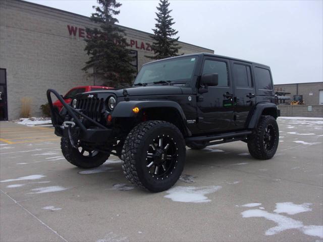 used 2012 Jeep Wrangler Unlimited car, priced at $18,999