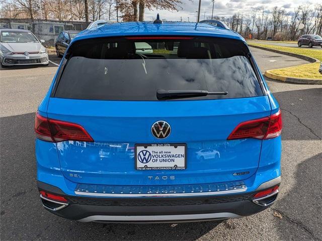 new 2024 Volkswagen Taos car, priced at $36,451