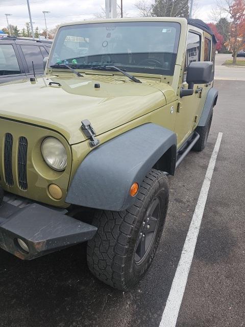 used 2013 Jeep Wrangler Unlimited car, priced at $10,951