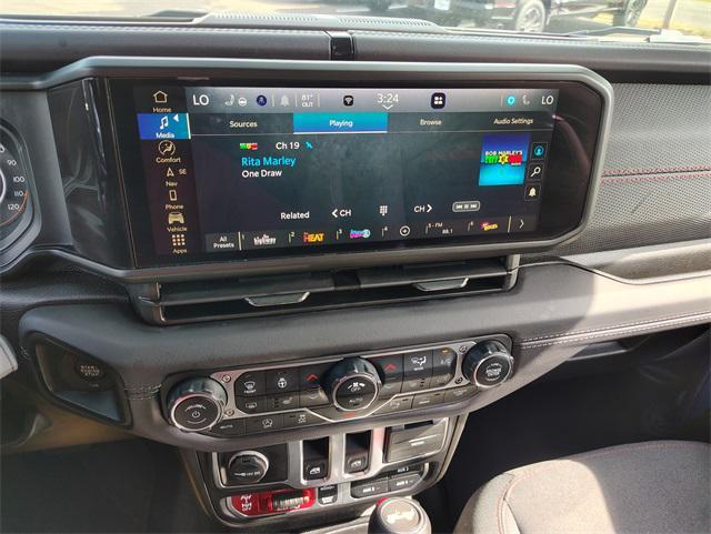 used 2024 Jeep Wrangler car, priced at $41,819