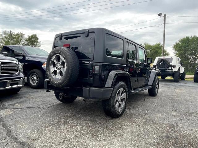 used 2016 Jeep Wrangler Unlimited car, priced at $23,495