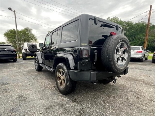 used 2016 Jeep Wrangler Unlimited car, priced at $23,495