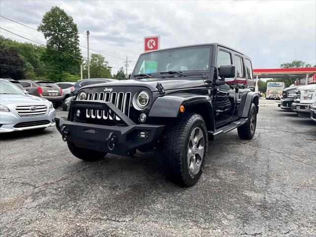 used 2016 Jeep Wrangler Unlimited car, priced at $23,495