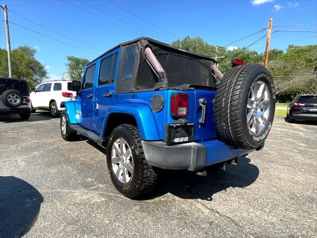 used 2016 Jeep Wrangler Unlimited car, priced at $26,995