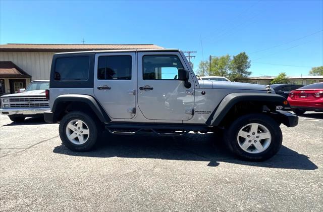 used 2015 Jeep Wrangler Unlimited car, priced at $20,895