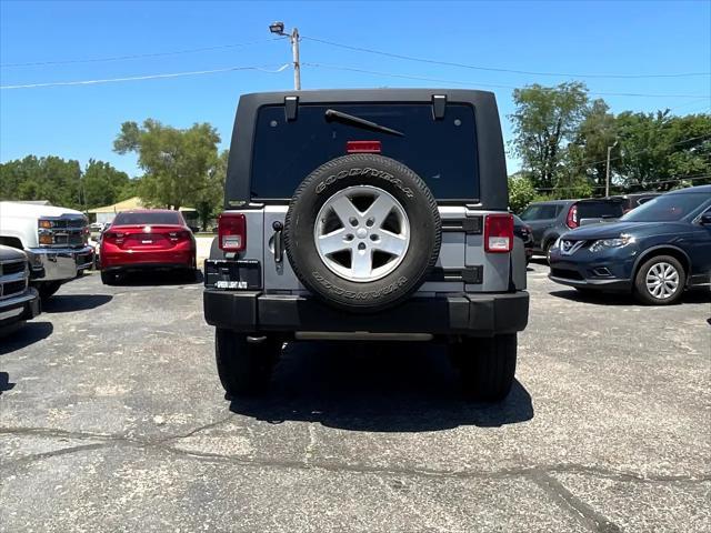 used 2015 Jeep Wrangler Unlimited car, priced at $20,895