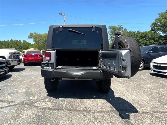 used 2015 Jeep Wrangler Unlimited car, priced at $20,895
