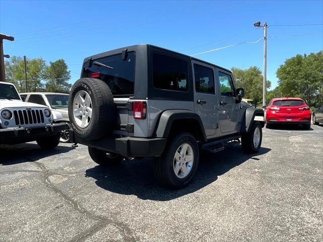 used 2015 Jeep Wrangler Unlimited car, priced at $20,895