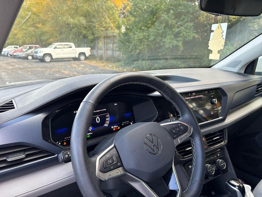 used 2024 Volkswagen Taos car, priced at $23,699