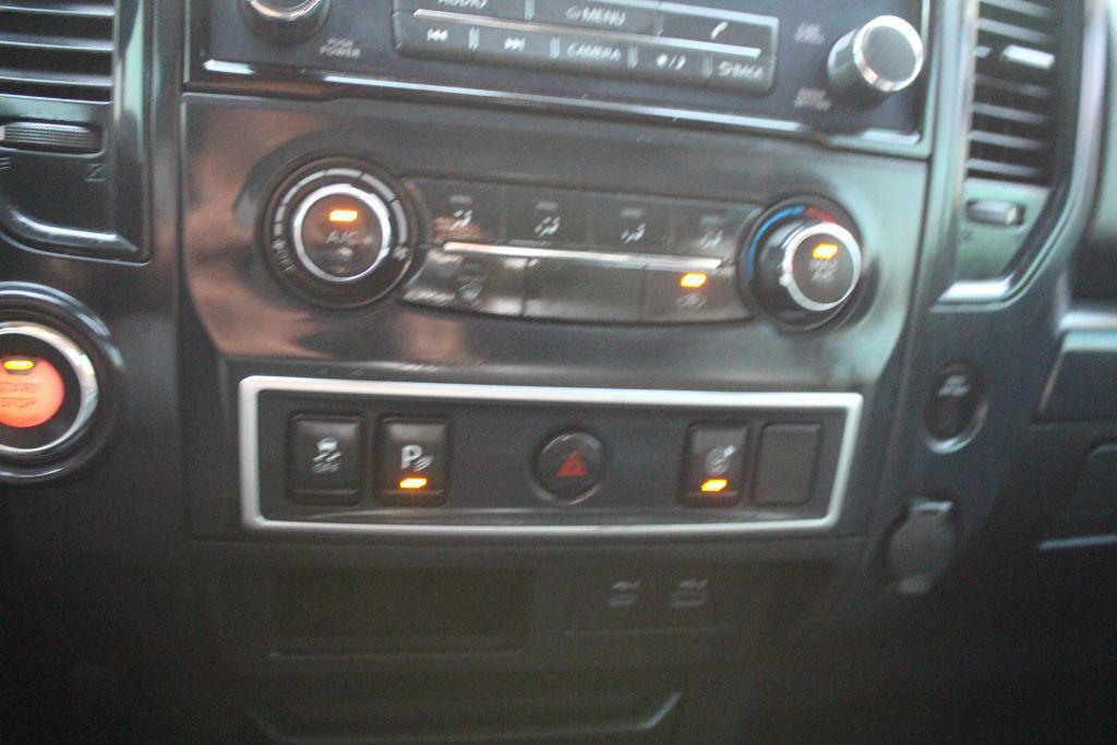 used 2021 Nissan Titan car, priced at $16,499