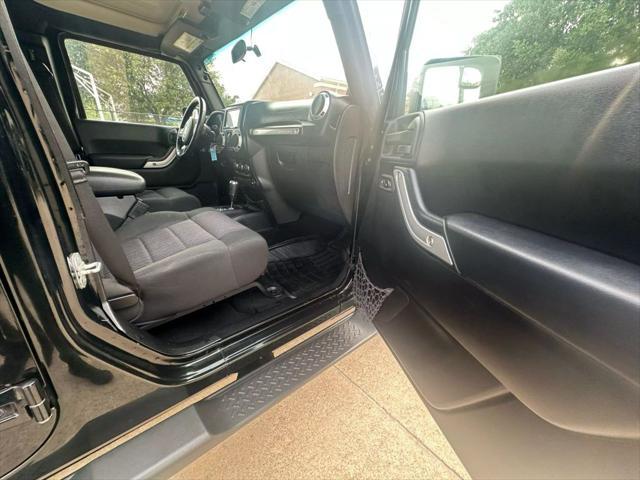 used 2012 Jeep Wrangler Unlimited car, priced at $12,999