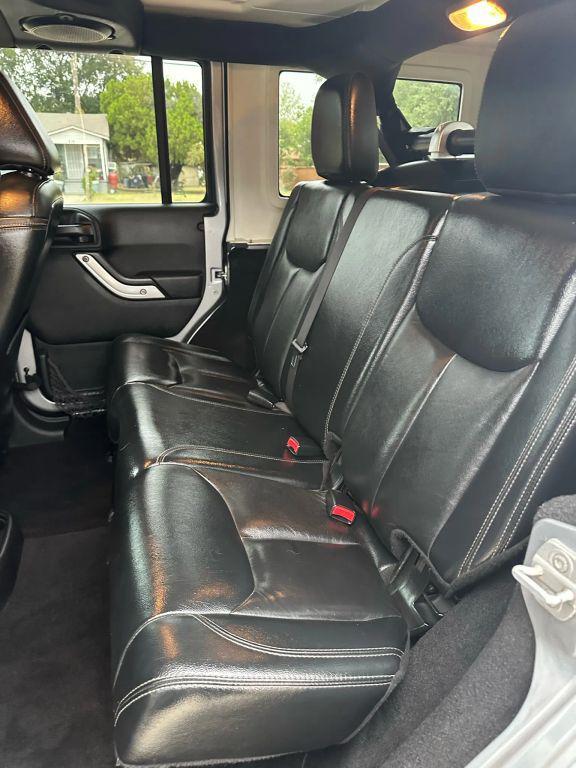 used 2013 Jeep Wrangler Unlimited car, priced at $12,499