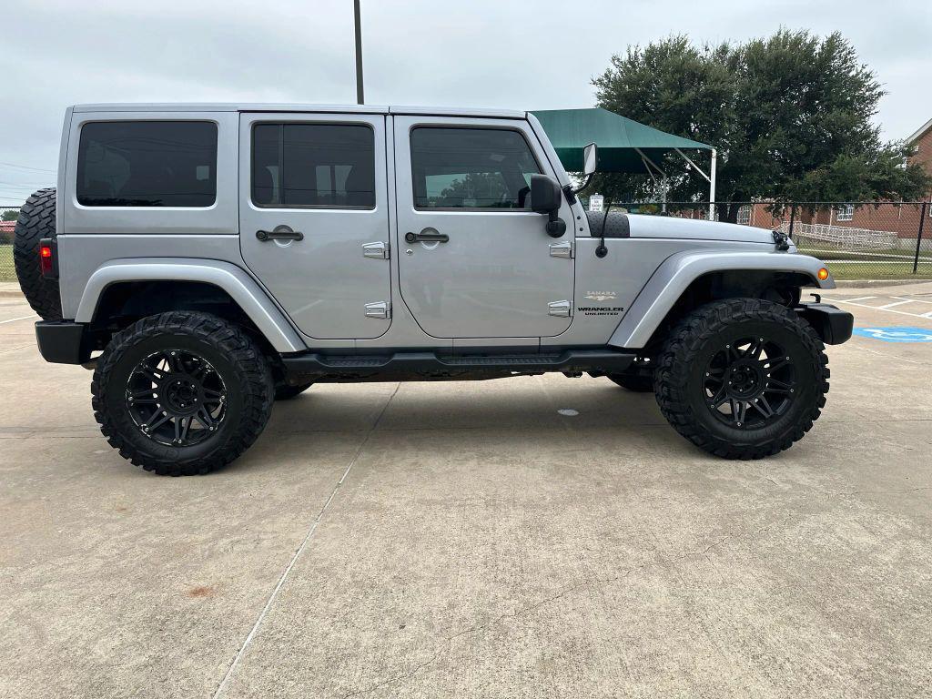 used 2013 Jeep Wrangler Unlimited car, priced at $12,499