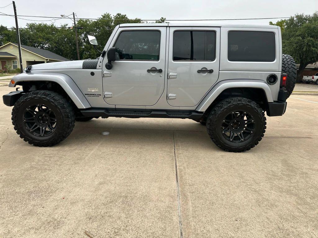used 2013 Jeep Wrangler Unlimited car, priced at $12,499