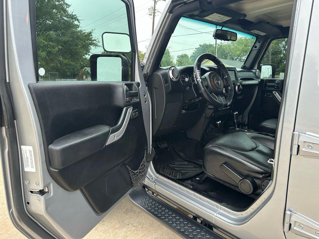 used 2013 Jeep Wrangler Unlimited car, priced at $12,499