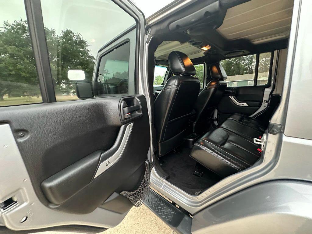used 2013 Jeep Wrangler Unlimited car, priced at $12,499