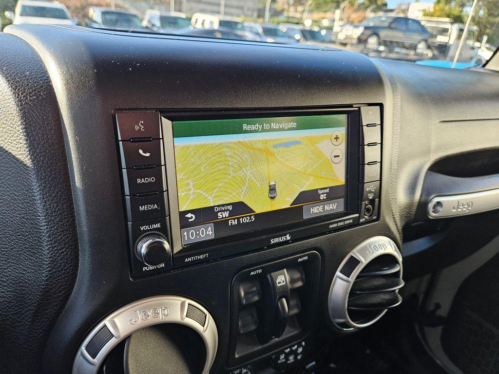 used 2018 Jeep Wrangler JK Unlimited car, priced at $23,499